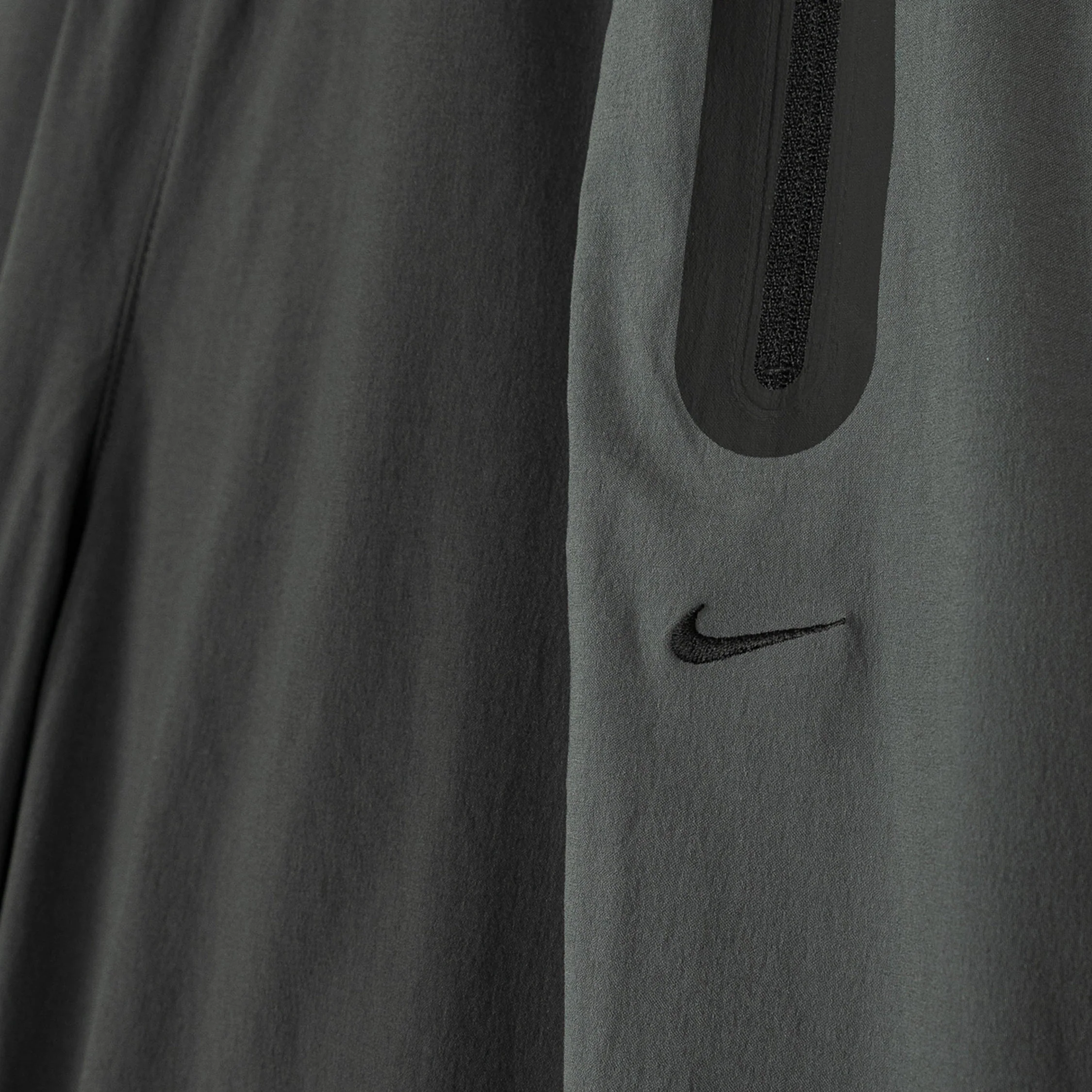 Nike	Tech Dri-Fit Woven Color-Block Trousers - Image 11